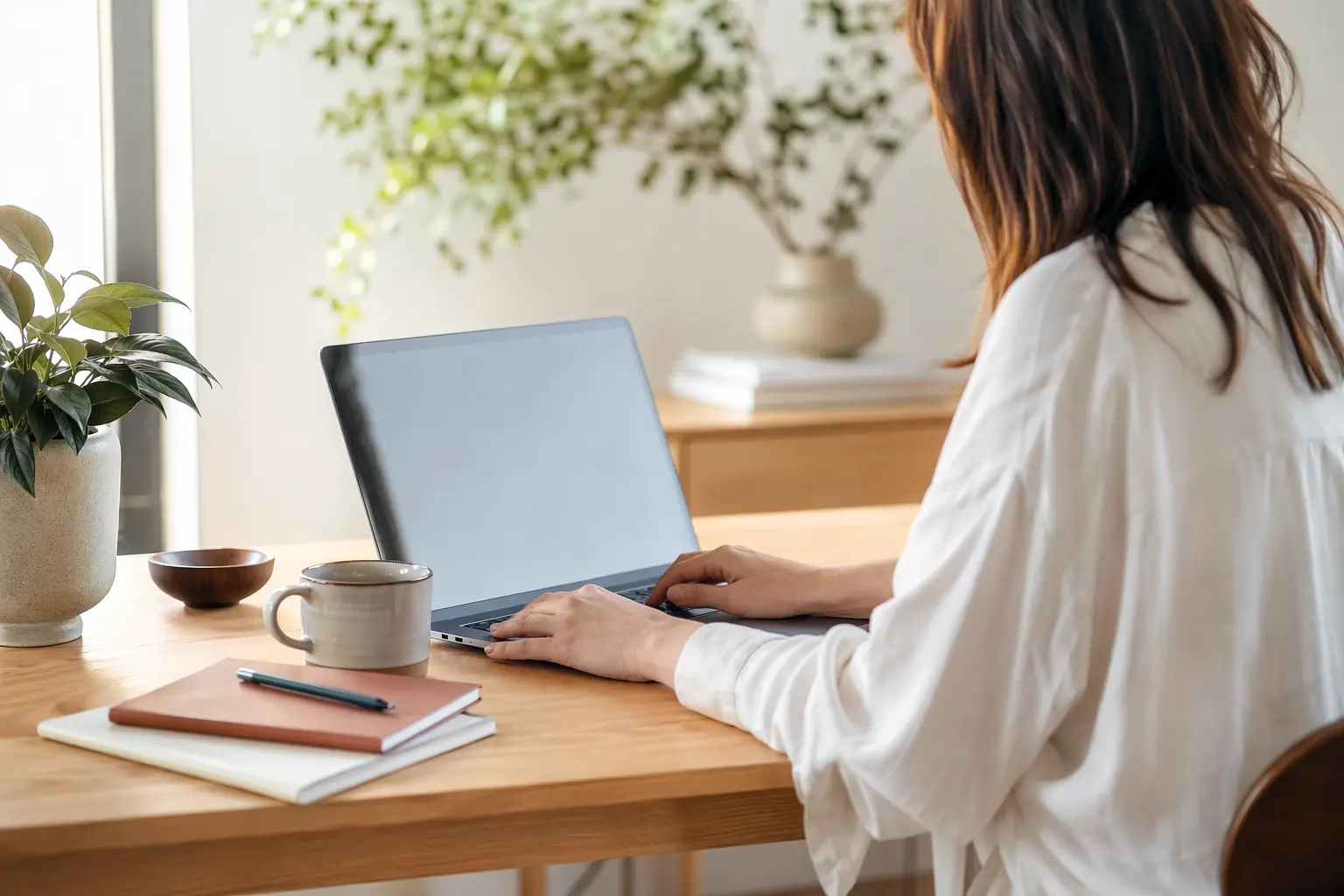 WordPress.com vs Solo website builder — man sitting on chair using silver laptop