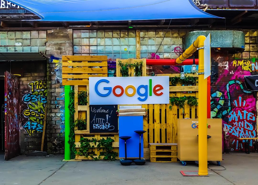Colorful Google storefront installation with yellow pallets and street art showcasing local business visibility